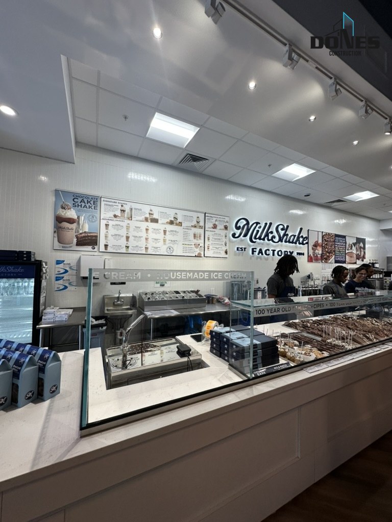 Milkshake Factory service area showing the counter, wall finishes and ceiling lighting
