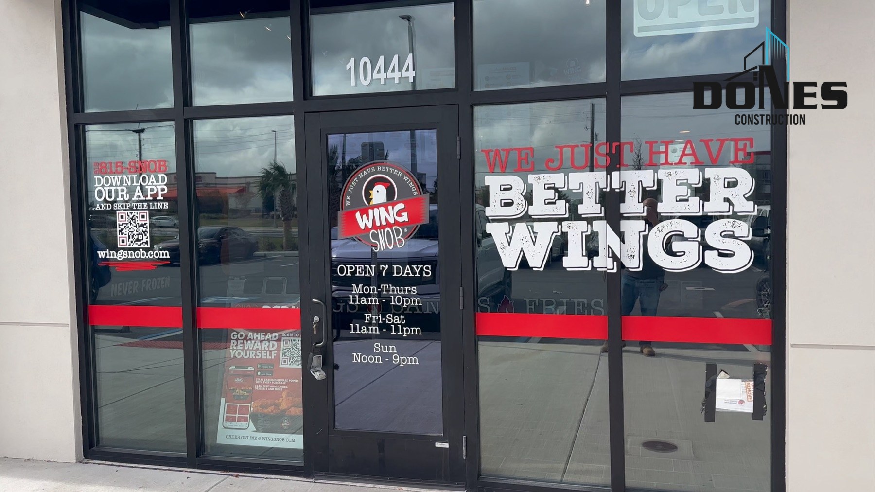 Completed branded Wing Snob storefront glazing
